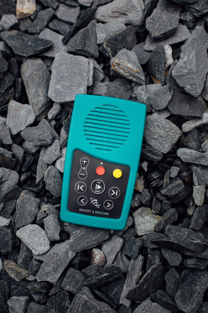 An Envoy 2 Encore facing the camera while placed on some slate rock.